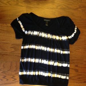 I-N-C blouse in black with white detail.